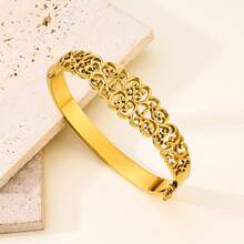 1件复古阿拉伯镂空雕花手镯，不锈钢材质，18K镀金，镂空雕刻花卉卷轴图案，优雅中东奢华风格，宫廷灵感设计，适合日常佩戴、派对、婚礼、节日等场合，是馈赠佳品。 - 金黃色 - 查看 3