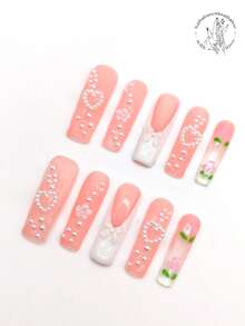 10 قطع من مسامير الأظافر المصنوعة يدويًا بالكامل، لوحة مسمار مربعة بطول 45 مم، لوحة مسمار شفافة بلون وردي فاتح، جزء أبيض للأظافر، مجوهرات فيونكة بيضاء ثلاثية الأبعاد، مجوهرات زهرة صغيرة بيضاء ثلاثية الأبعاد، تزيين خط مكون من لؤلؤ أبيض صناعي صغير، مجوهرات على شكل قلب أبيض، تصميم وردة مرسوم باليد. لوحة أظافر جميلة، مناسبة للاستخدام اليومي والترفيه والعطلات، والارتداء في الحفلات والمناسبات والعروض وغيرها من الأنشطة. لوازم الأظافر - متعدد الألوان - مشاهدة 3