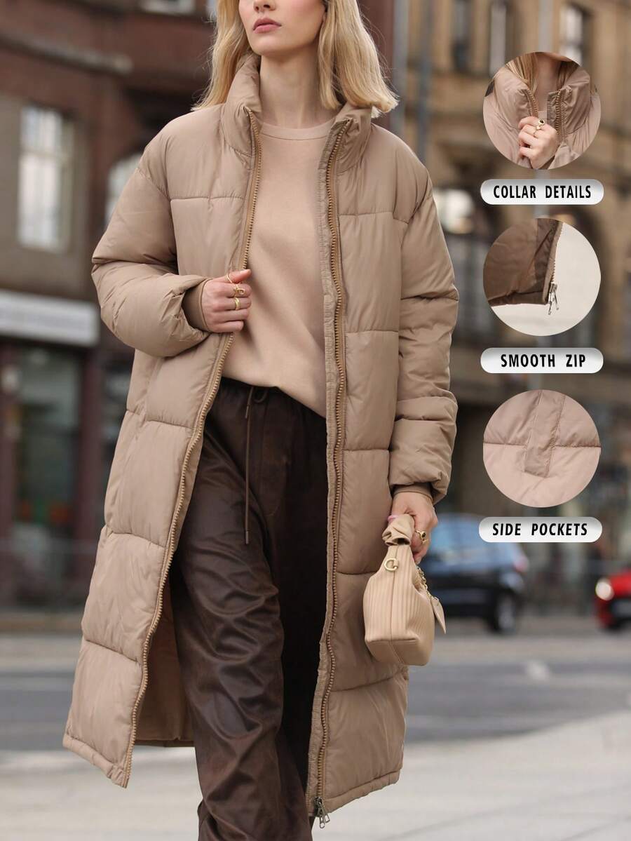 2026 Autumn/Winter Long Stand Collar Cotton-Padded Jacket, Loose Fit, Quilted Warm Outerwear, Smooth Zipper, Side Pockets, Simple Commuter Style Women's Cotton-Padded Jacket