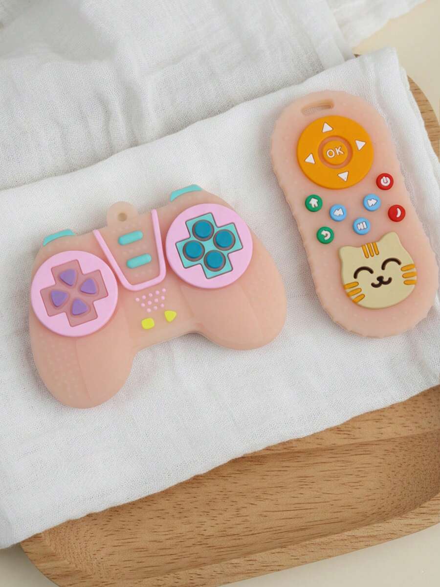 2 món đồ chơi gặm nướt bằng silicon hình tay cầm chơi game và điều khiển từ xa hình mèo cho bé 3-12 tháng tuổi, đồ chơi nhai kích thích giác quan. - Nhiều màu - Xem 1