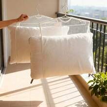 多功能晾衣网，可用于晾晒枕头和玩具，保护衣物，节省空间，并有助于收纳整理。