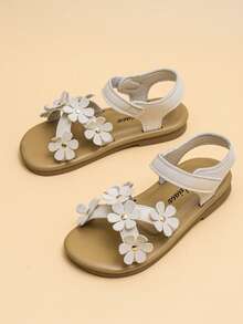 儿童鞋！这款精致的乡村风凉鞋适合3-7岁女孩穿着，采用编织鞋带和3D立体花朵装饰（配金色配件）。柔软防滑的白色和浅棕色鞋底配有可调节搭扣，不会磨脚。清新亮丽，适合日常外出和家庭旅行。 - 杏色 - 查看 5