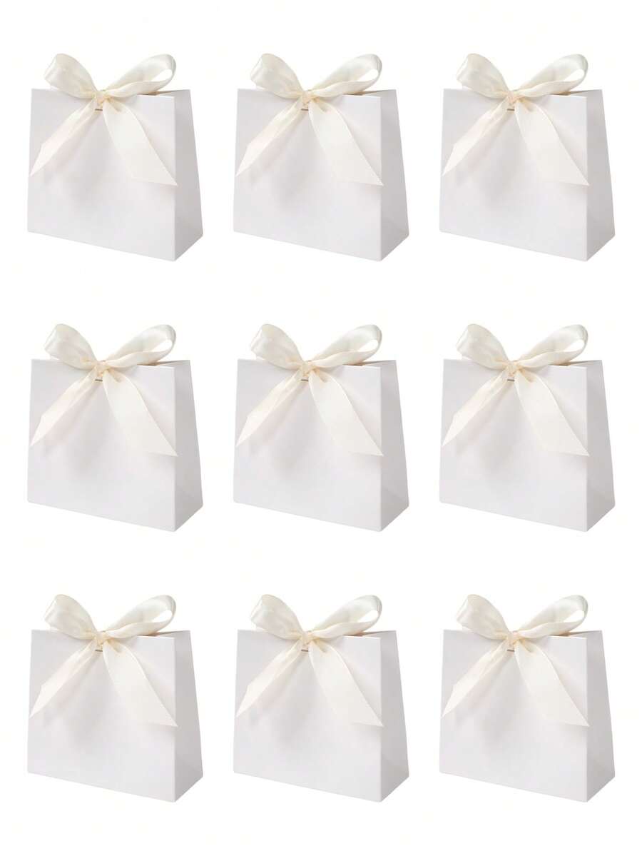 10 chiếc túi quà giấy mini, túi quà cưới có nơ, túi gói quà sinh nhật, túi mua sắm, túi quà tặng tiệc, quà tặng tiệc, đồ trang trí sinh nhật, đồ trang trí quà tặng tiệc, đồ dùng tiệc cưới, quà tặng tiệc cô dâu, quà tặng khách mời đám cưới
