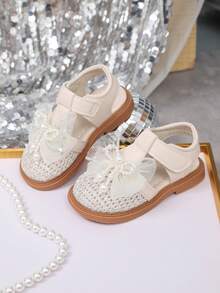 儿童时尚百搭镂空休闲凉鞋，女童蝴蝶结可爱幼儿凉鞋，包头公主凉鞋 - 米色 - 查看 1