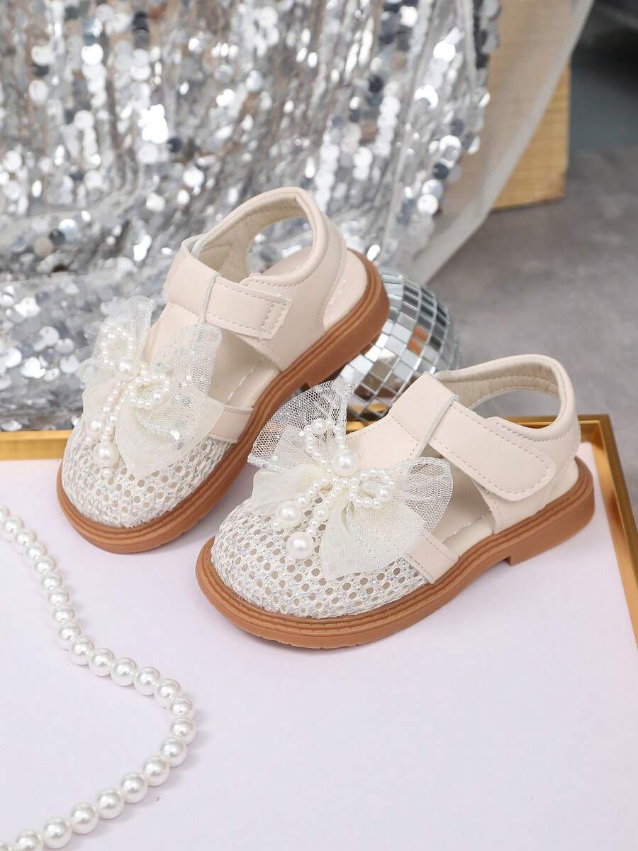 儿童时尚百搭镂空休闲凉鞋，女童蝴蝶结可爱幼儿凉鞋，包头公主凉鞋 - 米色 - 查看 1