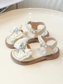 Dép xăng đan trẻ em mùa hè 2022 mới, dép xăng đan đế bằng mềm mại, thoải mái, đa năng, mũi tròn, hở ngón, đế bệt, thích hợp cho bé gái, học sinh, công chúa, dép xăng đan đế bằng thời trang cho bé gái. - Màu be - Xem 4