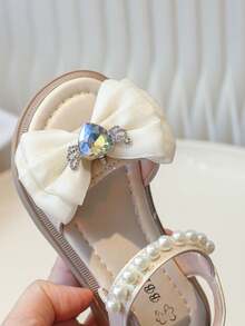 Dép xăng đan trẻ em mùa hè 2022 mới, dép xăng đan đế bằng mềm mại, thoải mái, đa năng, mũi tròn, hở ngón, đế bệt, thích hợp cho bé gái, học sinh, công chúa, dép xăng đan đế bằng thời trang cho bé gái. - Màu be - Xem 7