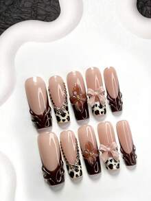 10pcs Champagne Rhinestone Nail Art Set. Includes Water Drop French Press-On Nails, Elegant Brown Flower Decals, Bow Nail Jewelry, Leopard Print Gel Nail Stickers, With Nail Tools (1 Jelly Sticker + 1 Nail File). Available In 3 Shapes: Almond, Duck Mouth, Coffin. Suitable For Autumn/Winter, Gatherings, Daily Wear, Parties Nail Supplies Handmade Press On Nails - Nhiều màu - Xem 13