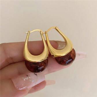 1 par de pendientes de aro en forma de U color marrón con efecto tie-dye dorado