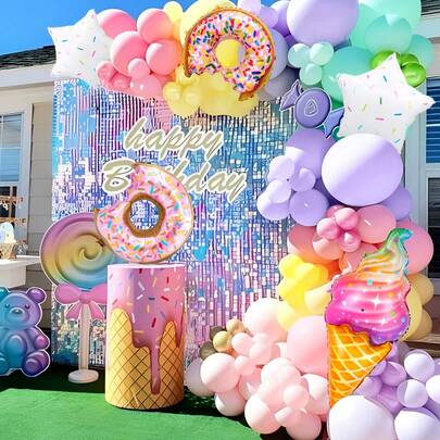 107件/套糖果主题气球拱门套装，包含冰淇淋、甜甜圈、星星铝箔气球和马卡龙乳胶气球，颜色有粉色、黄色、紫色、绿色，适用于生日派对、甜点主题派对、周年纪念、家居装饰、糖果店装饰、马卡龙主题氛围装饰、摄影道具。