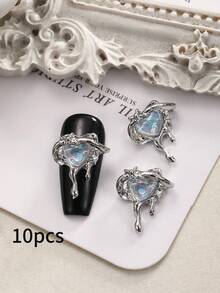 10件合金心形美甲装饰品，采用摩卡极光心形设计，是美甲的完美之选。浪漫、精致、可爱。适合约会、购物、郊游、派对等各种场合。这些DIY美甲配件、美甲宝石和美甲饰品融合了流行的欧美、日韩元素。美甲用品 - 彩色 - 查看 9