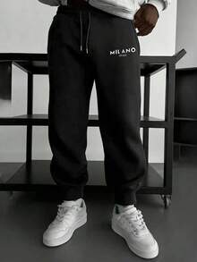 男士纯色简约百搭针织裤，十字印花，时尚有型，适合运动和休闲场合，款式多样，穿着舒适。女士们可以买来送给男友或丈夫，这将是一份很棒的礼物。 - 黑色 - 查看 8