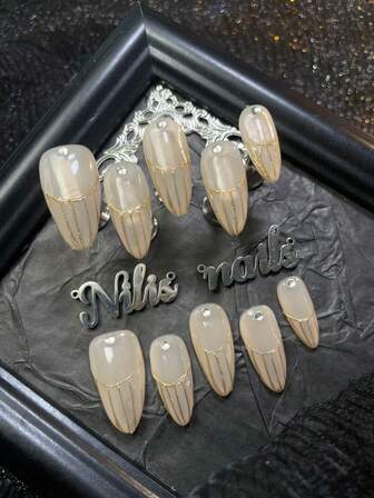 10-pack mandelformade akrylnagelset, aprikosfärgade naglar, färgglada 3D-diamantnageltillbehör, handmålade geometriska mönster, bärbart nagelset i Y2K-stil, lämpligt för kvinnor och flickor att bära på helgdagar, vardag, sammankomster, fester etc. Setet innehåller 1 mininagelfil och 1 dubbelsidig självhäftande etikett