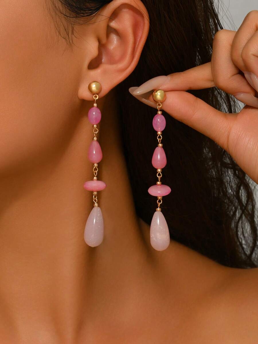 一对优雅夸张性感波西米亚风波浪形仿玉树脂块不对称吊坠金色贝壳耳钉，饰有流苏、桶珠和多色花卉树脂，适合性感派对和节日佩戴。树脂块采用人工混合颜色，每块树脂件可能带有模具痕迹，敬请谅解。 - 彩色 - 查看 1