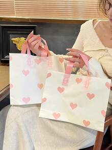 مجموعة 50/20/10 قطعة أكياس هدايا بنمط قلب بلاستيكية سميكة، أكياس تسوق لعيد الحب، أكياس تغليف هدايا عيد الحب، أكياس تسوق قابلة لإعادة الاستخدام، أكياس تسوق كبيرة، مثالية لتغليف هدايا عيد الميلاد. أكياس تسوق بشكل قلب مطفي، صناعة راقية، مع مقابض حمل أنيقة، مثالية لخلق جو هدايا راقي.
