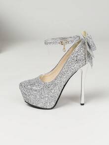 5.5英寸（14厘米）高跟女式时尚浅口鞋，厚底设计，闪亮银色材质，柔软舒适，蝴蝶结细高跟，优雅奢华，性感高跟鞋，单带设计，穿着稳固，适合婚礼、T台走秀、女士晚宴、约会、派对和夜店等场合。