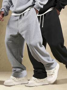 这款男士休闲运动裤采用宽松直筒版型，内衬抓绒，舒适垂坠。适合室内外穿着，也是送给情侣的绝佳礼物。裤子采用 100% 涤纶面料，配有抽绳腰带，可调节松紧，多种颜色可选。 - 灰色 - 查看 6