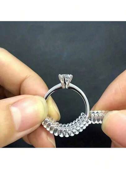 一套 4 个不同尺寸的戒指调节器，适用于松动的戒指，透明硅胶戒指保护套，男女皆宜，戒指调节器可让您在不改变戒指尺寸的情况下调节戒指。