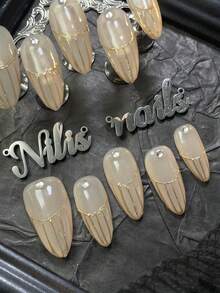 10片杏仁形亚克力美甲套装，杏色甲片，3D彩色钻石美甲配件，手绘几何图案，Y2K风格可佩戴美甲套装，适合女性和女孩在假期、日常、聚会、派对等场合佩戴。套装包含1个迷你指甲锉和1个双面胶标签。 - 杏色 - 查看 4