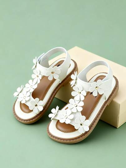 1双女童米色真皮3D雏菊装饰踝带凉鞋，清新甜美风格，适合夏季日常和上学穿着，可爱童鞋，热门单品，广受好评，百搭时尚，休闲风格，软底不磨脚，日常穿着的理想之选