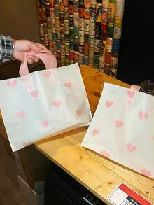 مجموعة 50/20/10 قطعة أكياس هدايا بنمط قلب بلاستيكية سميكة، أكياس تسوق لعيد الحب، أكياس تغليف هدايا عيد الحب، أكياس تسوق قابلة لإعادة الاستخدام، أكياس تسوق كبيرة، مثالية لتغليف هدايا عيد الميلاد. أكياس تسوق بشكل قلب مطفي، صناعة راقية، مع مقابض حمل أنيقة، مثالية لخلق جو هدايا راقي.