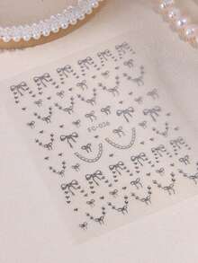 Simple And Versatile Hand-Painted Ribbon Bow Nail Stickers, Featuring Gold And Silver Bow, Star, And Chain Patterns, And Shimmering Gold Foil. Perfect For New Year's And Valentine's Day.