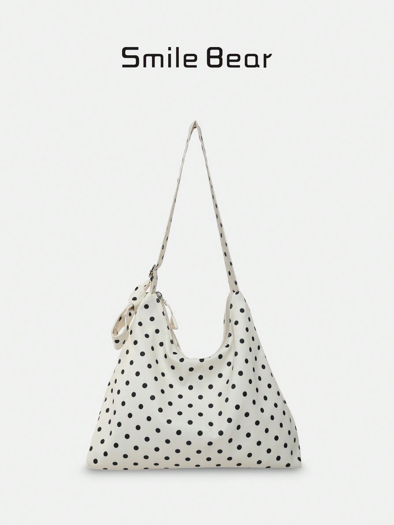 Polka dot crescent sling bag