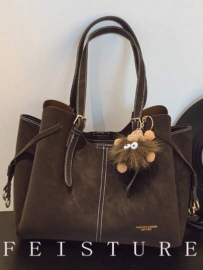 1个FEISTURE大容量PU手提包，时尚单肩包带吊坠，适合女孩、女士、大学生、年轻职业人士，非常适合工作、商务、通勤和上学使用。