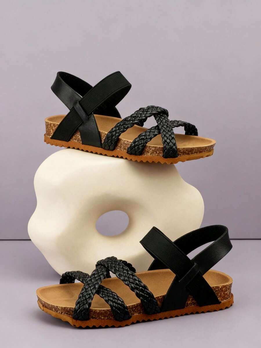 1双儿童编织装饰仿皮软木防滑露趾交叉踝带平底凉鞋，简约时尚，可爱休闲，适合夏季日常穿着和户外活动 - 黑色 - 查看 1