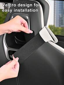 汽车安全带调节器，防止胸部受压和碰撞噪音，适用于汽车运动座椅。它有助于避免安全带对肩部和颈部的压力，推荐用作便携式限位器和安全气囊调节器，以提高舒适度。 - 安全帶固定器 - 查看 3