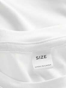 这款专为女孩设计的休闲套装采用时尚的字母印花设计，包括一件白色短袖圆领T恤和一条中腰喇叭裤。 - 白色 - 查看 9