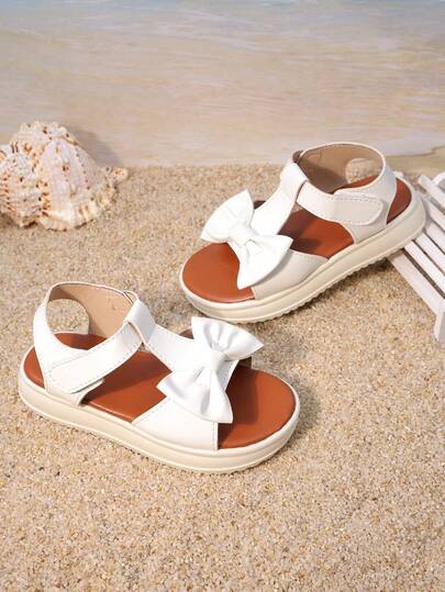 1 Pair Of Girls' Shoes With White Bow Strap Sandals, The Upper Is Made Of Faux Leather Material, Decorated With Three-Dimensional Bow Straps, Low Cut Design With Exposed Toes, Comfortable Thick Sole, Sweet Princess Style, Suitable For Birthday Parties And Children's Day Activities