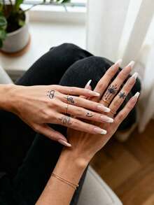 6 PCS Herbal Juice Tattoo Semi-Permanent Magic Festival Tattoos Stickers. Simple And Cute Cat, Bear, Dinosaur, Cactus, Dessert, Heart, Bow Tie, Snake, Spider Web, Elements, Flowers - "HAPPINESS". Text Pattern Of Planets. Pizza, Cocktail, Campfire, Puzzle. Valentine's Day, Carnival Gifts. Pattern. Minimalist Tattoo - Blue - View 3