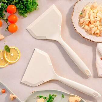 This Wide-Blade Spatula Features A One-Piece Design Made Of Durable, Heat-Resistant Silicone That Is Easy To Clean. The Convenient Hanging Hook Design Allows For Easy Drying. It Can Be Used As A Pizza Spatula, Steak Spatula, Egg Spatula, And Fruit Spatula, Making It An Ideal Kitchen Tool For Home Cooking And Outdoor Camping. Additionally, It Makes A Great Gift For Friends And Family, A New Year's Gift, Valentine's Day Gift, Or Ramadan Gift.