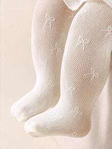 米色蝴蝶结连体衣，透气凉爽，适合女宝宝。是女宝宝生日派对的完美之选。适合0岁以上女宝宝，也是圣诞节/感恩节的理想礼物。