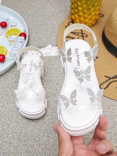 1 Đôi sandal đế xuồng trong suốt đính đá hình bướm thời trang, lấp lánh và xinh xắn dành cho bé gái, kiểu dáng cổ tích, thích hợp cho mùa hè.