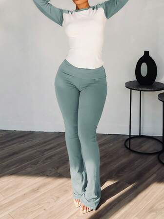 欧美风女式圆领拼布修身长袖运动T恤上衣和修身喇叭腿运动裤套装，秋冬