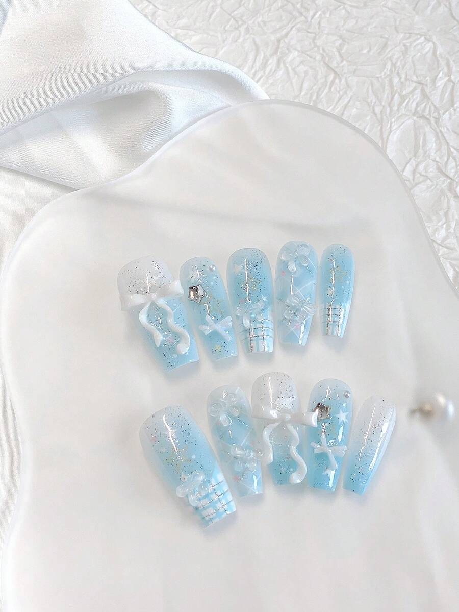 10PCS Medium-Long Coffin Press On Nails - Handmade Light Blue French Ombre Glitter Nails | Kawaii 3D Bow/Star/Rhinestone Embellished Fake Nails With Baby Blue Gradient Blending | Press-Ons Kit: 1 Sheet Jelly Glue + Mini Nail File | Reusable Shimmery False Nails For Women (Cute Aesthetic Medium-Long Coffin Shape) - Follow Your Heart - View 1