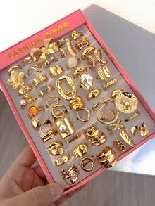 Bộ nhẫn nhiều chiếc kiểu cổ điển, thanh lịch, dày dặn, có thể xếp chồng lên nhau gồm 30/20/15/10/6 chiếc - với các họa tiết hoa, nơ, hình học, ngọc trai, hình dạng bất thường, vân đá nhiều màu sắc, hình trái tim, xếp nếp, rỗng, vuông, tròn, xoắn, dây bện, tối giản, vòng trơn, nhẫn ngoại cỡ, dày dặn, thời trang, thanh lịch, tinh tế, thiết kế retro, phù hợp cho kỳ nghỉ, tiệc tùng, hẹn hò, làm quà tặng, đeo hàng ngày. - Vàng - Xem 4