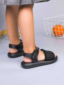 1 Đôi dép xăng đan đế bằng dệt cổ điển, nhẹ, mềm mại, kiểu dáng thời trang mới, dành cho trẻ em, có khóa dán, thích hợp cho mùa hè, dùng được cho cả nam và nữ, có khả năng chống mài mòn và chống trơn trượt. - màu đen - Xem 19