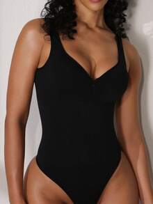 女士黑色无袖前拉链连体裤 - 无缝修身设计