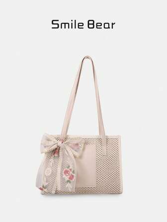 Nueva bolsa de hombro para mujer de gran capacidad para primavera/verano, diseño de nicho minimalista y de moda, versátil bolsa de playa de paja trenzada