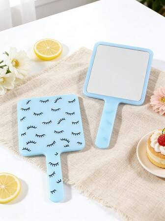 1 pieza Nuevo espejo compacto de maquillaje con asa y estampado de pestañas de dibujos animados, espejo mini portátil para bolso, espejo de alta definición talla grande vendido, conveniente para retoques