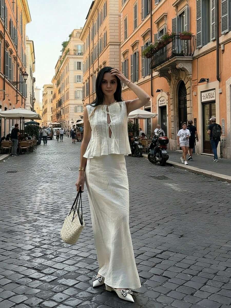 两件套女士休闲无袖圆领褶皱系带露脐上衣和低腰美人鱼长裙套装，包括裙子、配套吊带背心、飘逸雪纺裙、性感吊带沙滩装、可爱蝴蝶结装饰外套，适合春、夏、秋季穿着。