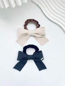 可爱单件装女士蝴蝶结装饰时尚发圈，可用于头发装饰、发饰、马尾辫、发圈、发绳、发绳扎发、发圈、发饰，也是馈赠佳品。