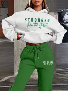 New Style Women's Two-Piece Set -  Women's Christmas SweatshirtWomen's Two-Piece SetCasual Loungewear & Outdoor WearWomen's "Stronger Than The Storm" Graphic Cropped Hoodie & Sweatpants Set - Motivational Loungewear, Oversized Fit For Casual & Athleisure Styles, Multiple Colors"Empowerment Graphic Two-Piece Sweatsuit - Cropped Hoodie With Inspirational Slogan & Drawstring Sweatpants, Cozy Outfit For Daily Wear & Workouts""Oversized Cropped Hoodie And Sweatpants Set For Women - 'Stronger Than The Storm' Print, Soft Fabric Loungewear Perfect For Relaxed Days & Active Lifestyles"  Perfect Spring-Fall Softness & Comfort  Summer Outfits For Women  Summer Outfits Ropa Deportiva  Spring & Fall Women's Apparel Active Wear Women   Summer  Gym Mujer  Gym Mujer  Workout Clothes For Women  Sweatshirts For Women  Women's All Season Clothes Women's Spring Clothes Women's Summer Clothes Women's Year Round Outfits Spring Fashion For Women Summer Fashion For Women - 綠色 - 查看 1