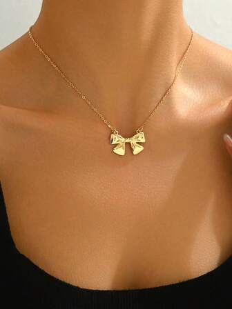 1 pieza Elegante y lindo collar con colgante de lazo versátil, adecuado para el uso diario de las mujeres