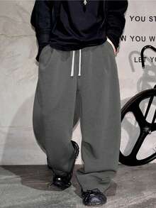 男士宽松休闲直筒运动裤，纯色设计，抽绳腰带，大口袋，适合日常行走、工作、旅行等场合。由于生产批次不同，可能存在一些色差。 - 深灰色 - 查看 10