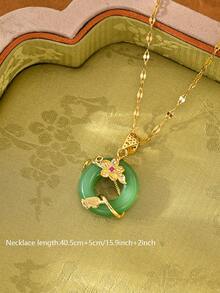 一条18K镀金不锈钢项链，搭配镶嵌人造锆石的玉石如意吊坠，奢华精致，个性时尚，百搭实用，适合女性日常佩戴、参加派对、音乐节，也是馈赠亲友的理想之选。 - 綠色 - 查看 2