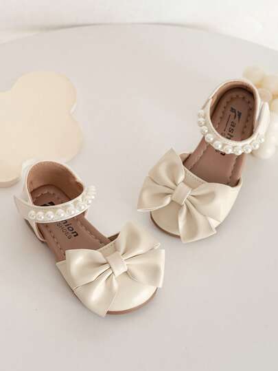 女童珍珠蝴蝶结凉鞋，夏季软底包头鞋，儿童公主风真皮鞋